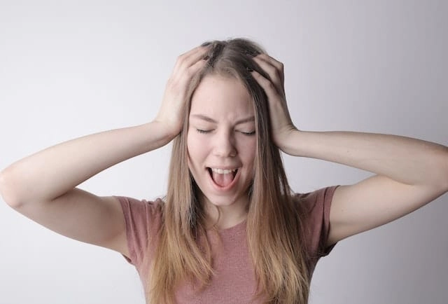 Photo by Andrea Piacquadio: https://www.pexels.com/photo/young-frustrated-woman-screaming-with-closed-eyes-3885618/ - mistake