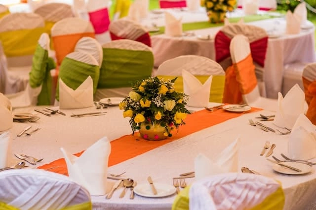 Photo by Antony Trivet: https://www.pexels.com/photo/a-centerpiece-at-a-dining-table-13644778/ -- company party