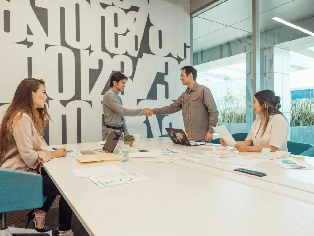 Charities in New York Photo by Kindel Media: https://www.pexels.com/photo/a-group-of-people-having-a-meeting-in-the-office-7651709/