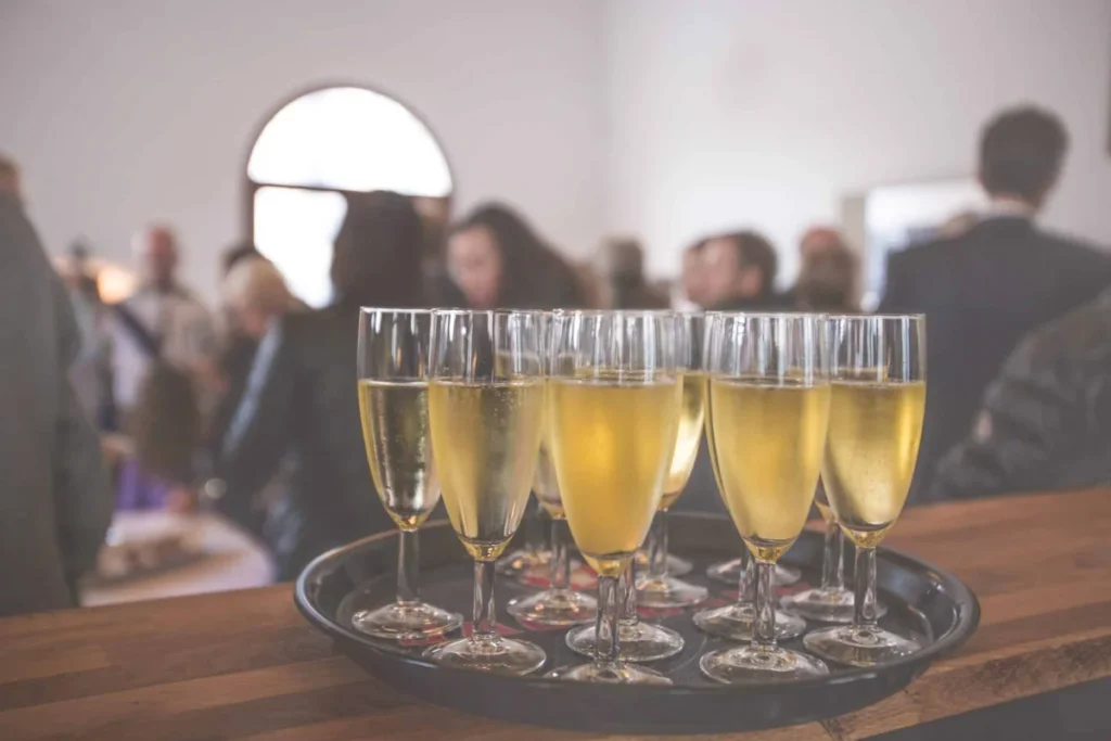 Event Planners in NYC Photo by Salo Al: https://www.pexels.com/photo/clear-flute-glasses-on-black-tray-16408/
