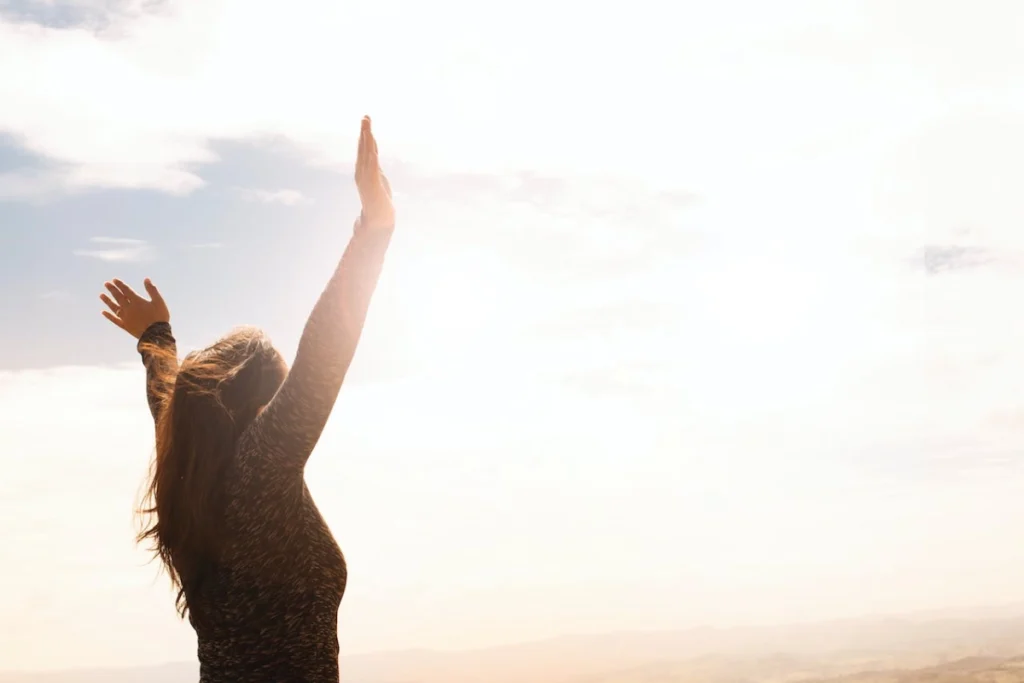 Photo by Daniel Reche: https://www.pexels.com/photo/photo-of-woman-raising-both-hands-1556691/ -- stress-free