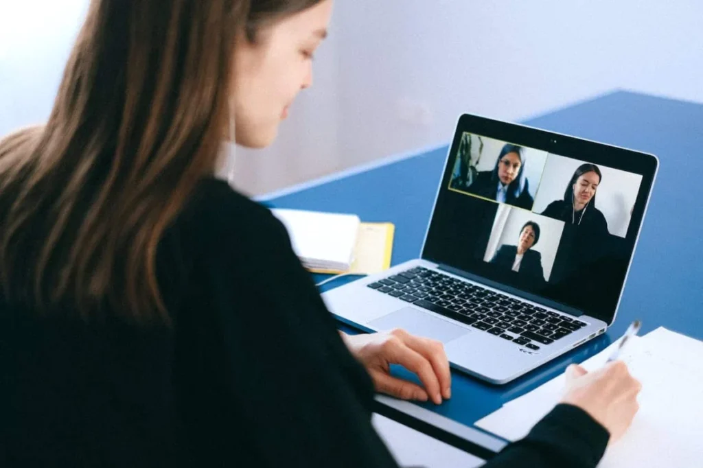 Photo by Anna Shvets: https://www.pexels.com/photo/people-on-a-video-call-4226140/ -- virtual team meeting