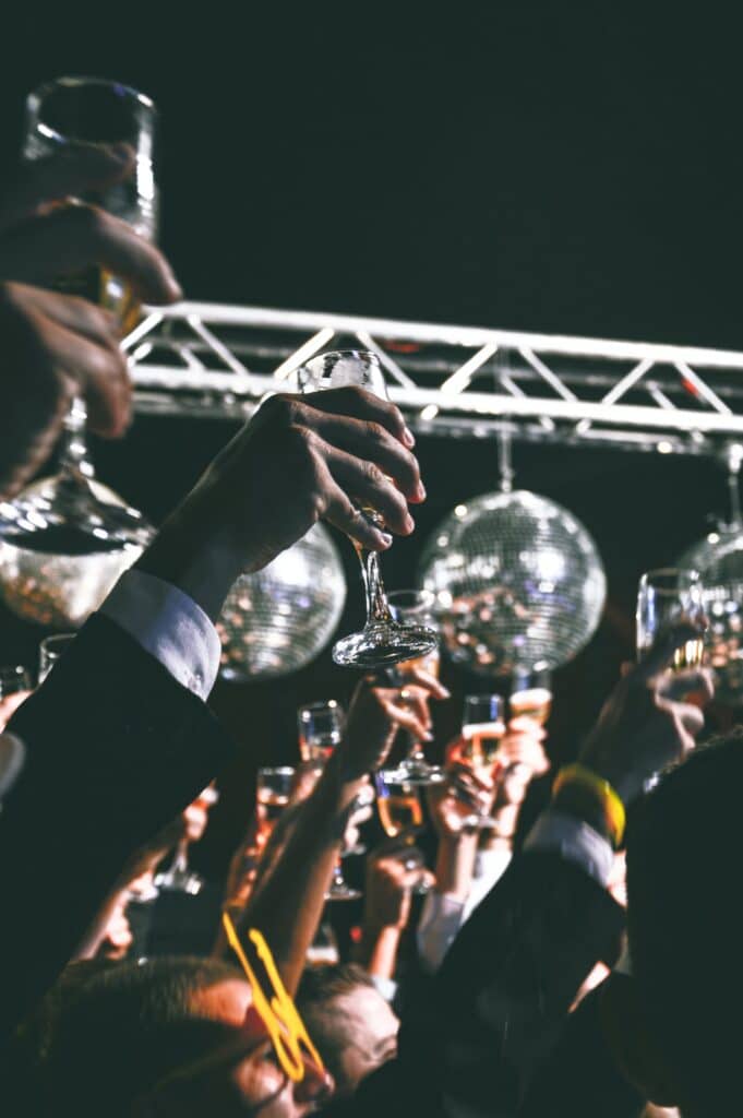 NYC Event Production Company Photo by Caio : https://www.pexels.com/photo/person-holding-clear-flute-glass-59884/