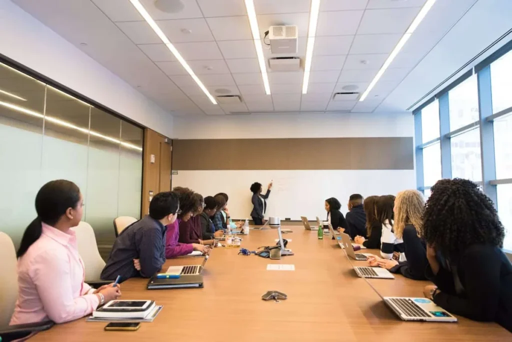 Photo by Christina Morillo: https://www.pexels.com/photo/group-of-people-on-conference-room-1181396/ -- corporate meeting