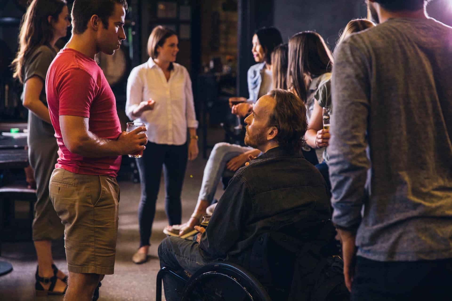 Image Title: Inclusive Conversations Image Description: Colleagues conversing in an accessible office gathering Alt Text: Accessible Office Event Source: https://www.pexels.com/photo/group-of-people-drinking-and-talking-3009769/