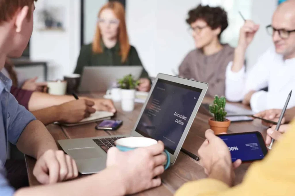 Photo by fauxels: https://www.pexels.com/photo/people-inside-room-3184660/ -- corporate meeting