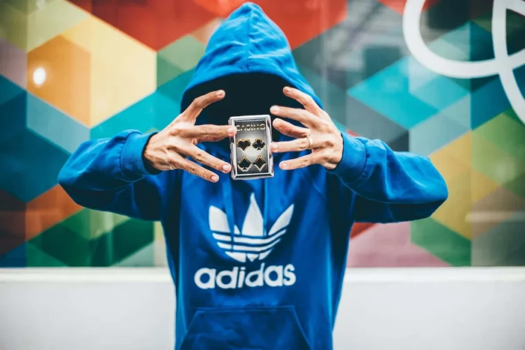 Photo by Kaique Rocha: https://www.pexels.com/photo/man-in-blue-adidas-hoodie-doing-magic-trick-48013/ -- magician