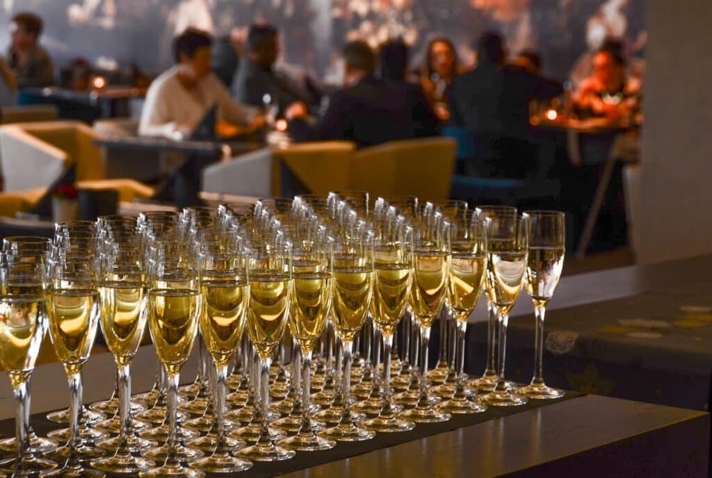 Image by Rudy and Peter Skitterians from Pixabay https://pixabay.com/photos/celebration-party-wine-champagne-3057027/ -- event production