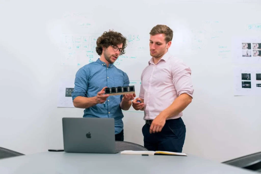 Photo by ThisIsEngineering: https://www.pexels.com/photo/engineers-in-meeting-3912477/ product demos