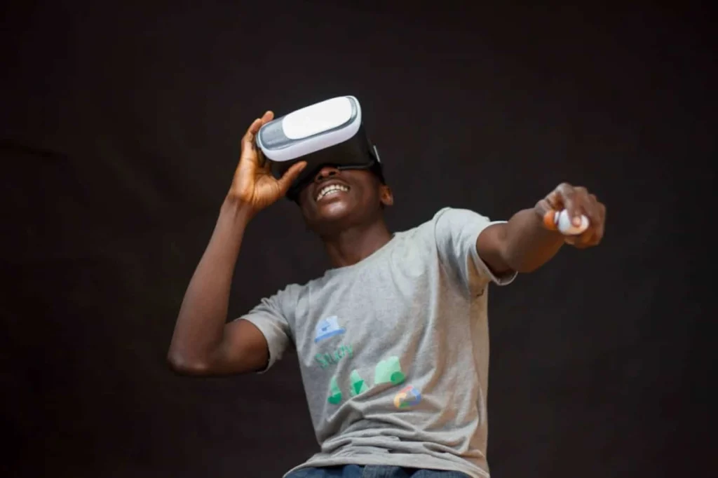 Photo by Areous Ahmad: https://www.pexels.com/photo/man-wearing-grey-shirt-using-virtual-realty-headset-3175983/ -- virtual reality tech