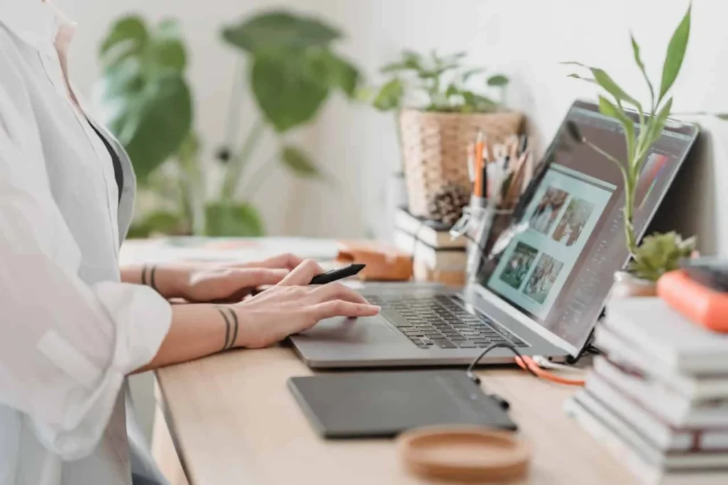 https://www.pexels.com/photo/woman-working-retouching-photo-on-laptop-at-convenient-workplace-7014337/ -- remote work