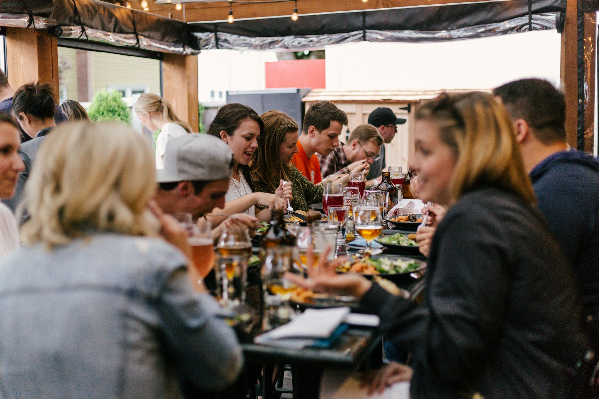 Image title: corporate events Image alt-title: people-sitting-in-front-of-table-talking-and-eating Image URL: https://unsplash.com/photos/people-sitting-in-front-of-table-talking-and-eating-W3SEyZODn8U 