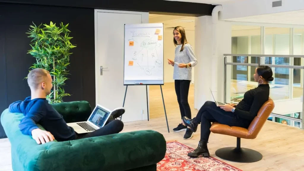 Photo by Elevate Digital: https://www.pexels.com/photo/two-person-listening-to-woman-standing-beside-poster-1647919/ -- breakout sessions