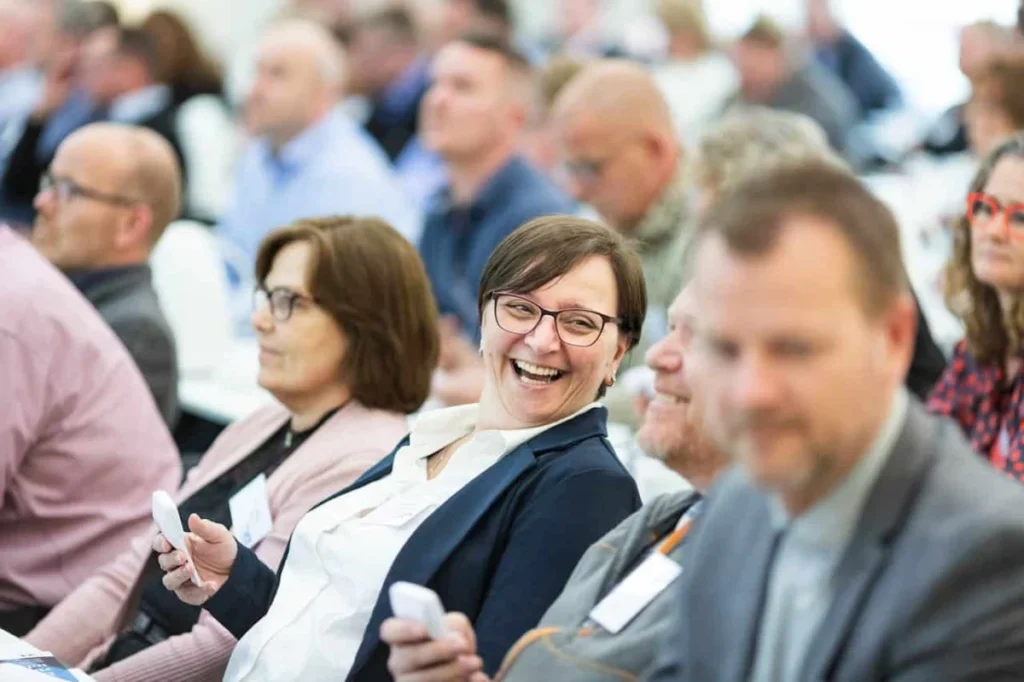 Photo by Rene Asmussen: https://www.pexels.com/photo/people-sitting-on-chair-2505056/ -- team-building events