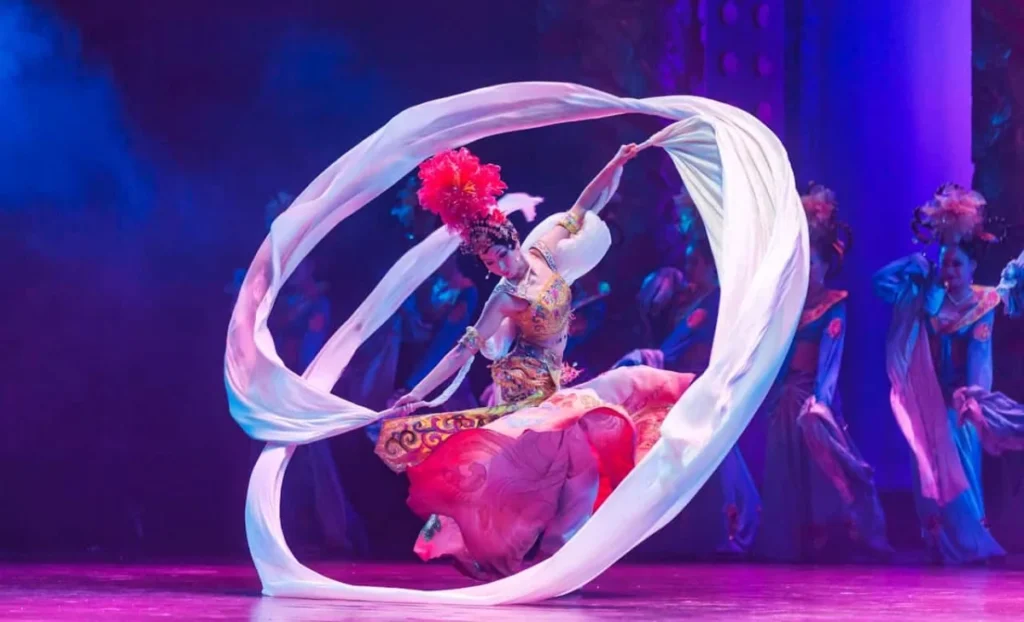Photo by Robert Stokoe: https://www.pexels.com/photo/woman-dancing-2736742/ -- event entertainment