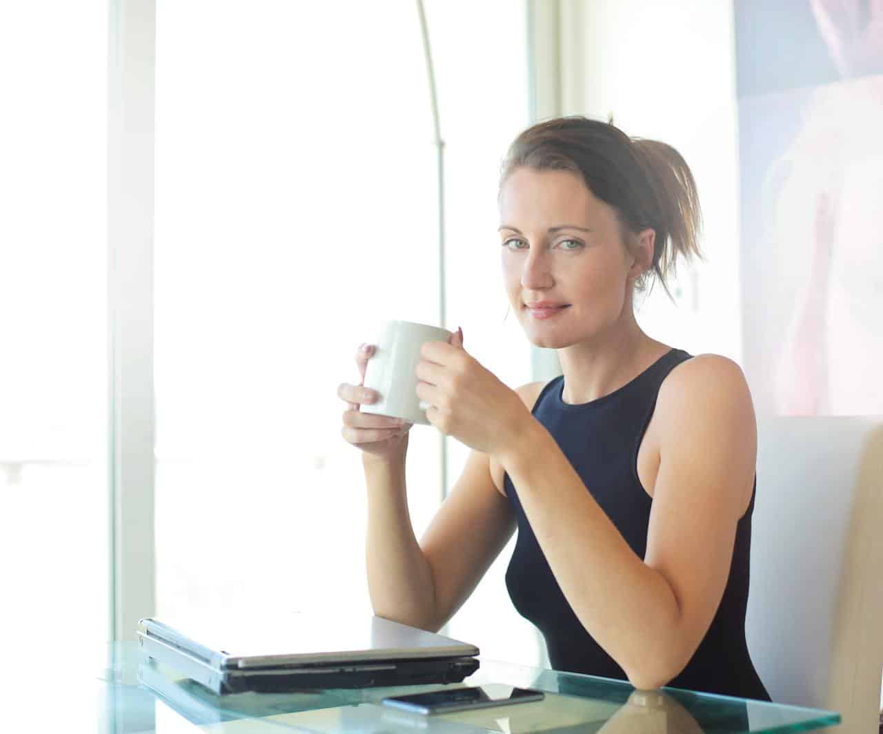 Photo by Andrea Piacquadio: https://www.pexels.com/photo/woman-in-black-tank-top-holding-white-ceramic-cup-3779760/