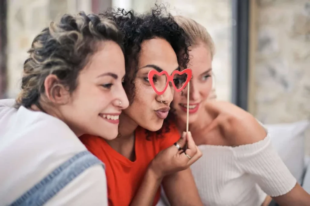 Photo by Adrienn: https://www.pexels.com/photo/three-women-posing-for-photo-1524105/ -- event entertainment