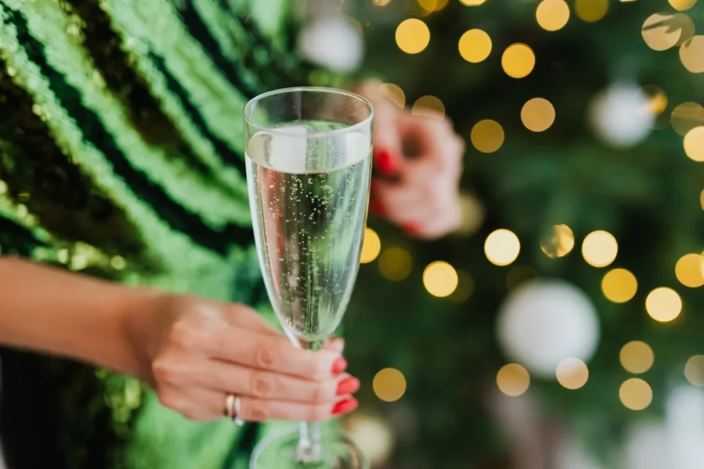 Photo by Photo By: Kaboompics.com: https://www.pexels.com/photo/shallow-focus-photo-of-person-holding-a-glass-of-wine-5472971/ -- fundraising gala drink