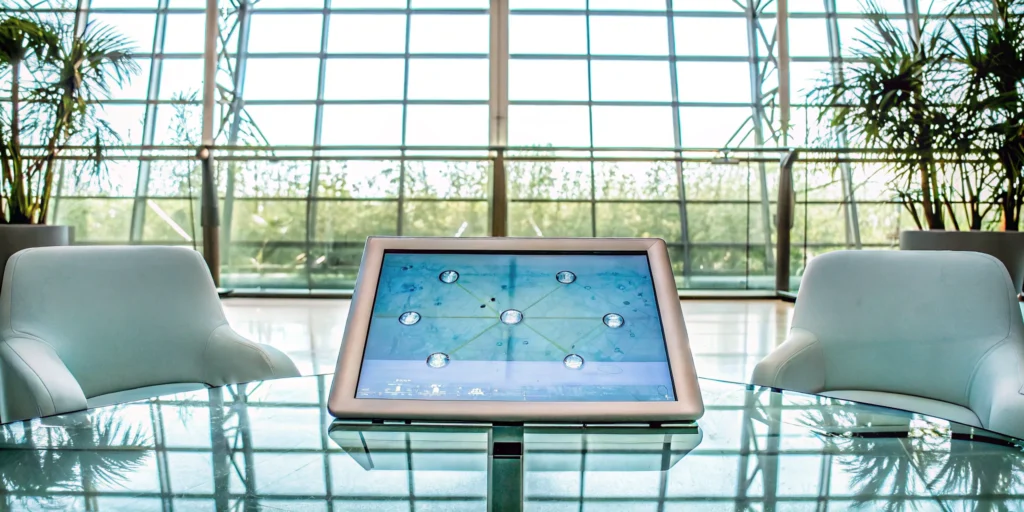 A planner using a touchscreen to manage a flawless event with one of the best hybrid platforms.