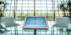 A planner using a touchscreen to manage a flawless event with one of the best hybrid platforms.