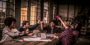 Best corporate team building event. Diverse team celebrating success.