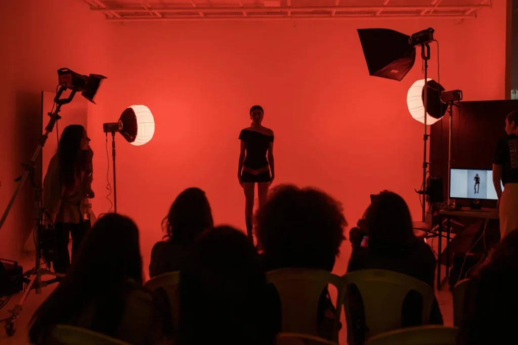 Photo by Matheus Bertelli: https://www.pexels.com/photo/professional-fashion-shoot-with-red-lighting-ambiance-33714927/