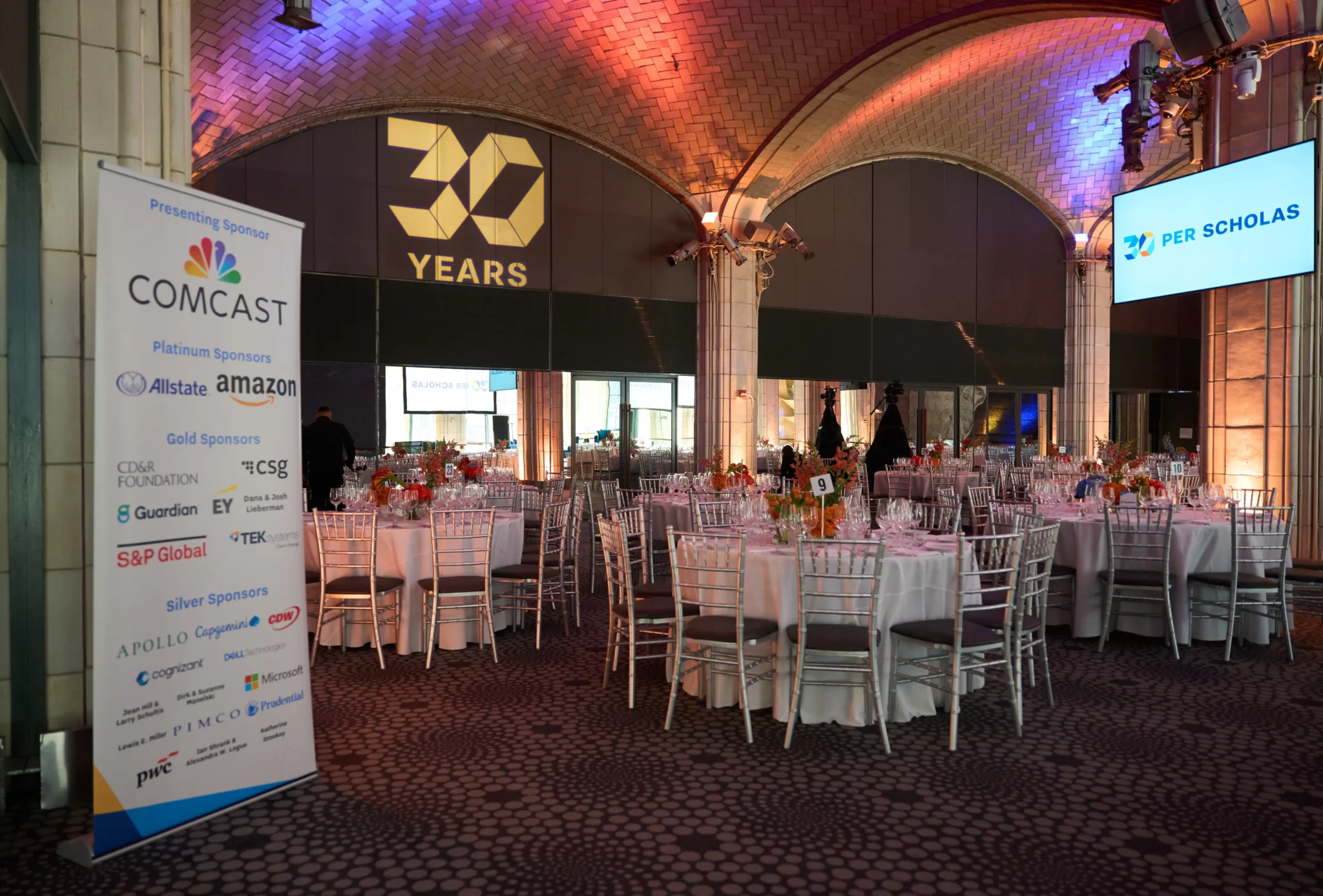 30th anniversary gala setup under a vaulted ceiling, corporate event venue in NYC by EMRG Media